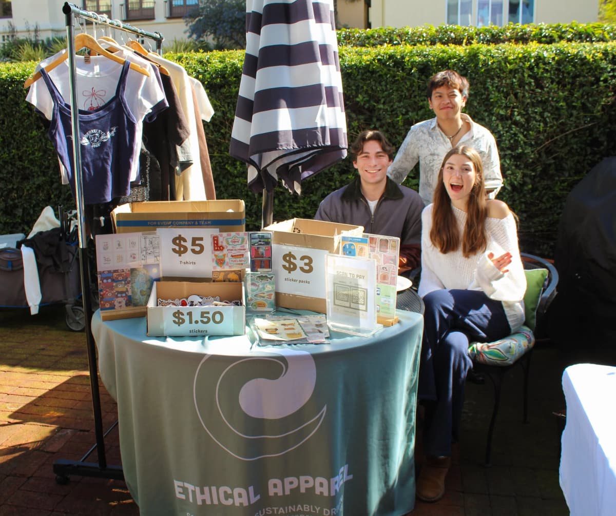 EthiCAL Apparel market stall with students